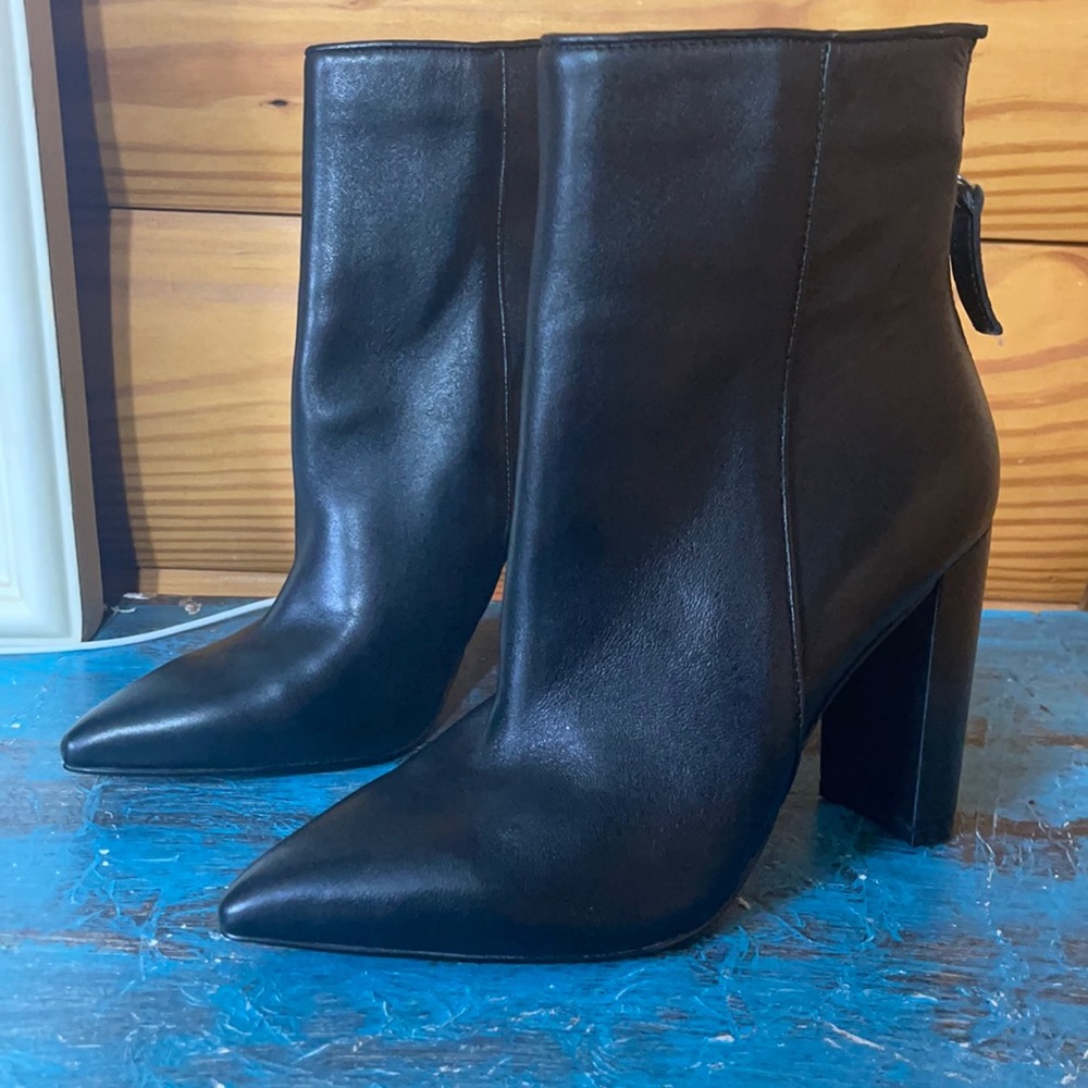 Black heeled booties (excellent condition)
